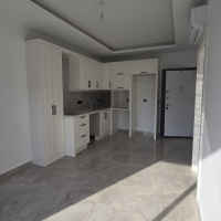 Стильная квартира 1+1 в районе Оба — 600 м до моря, премиум-комплекс, возможна под краткосрочную аренду