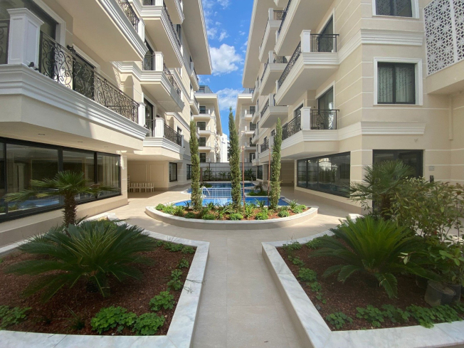 Стильные апартаменты 1+1 с мебелью в 4 минутах от пляжа – идеальны для жизни и аренды