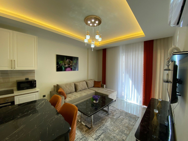 Стильные апартаменты 1+1 с мебелью в 4 минутах от пляжа – идеальны для жизни и аренды