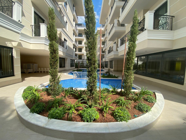 Стильные апартаменты 1+1 с мебелью в 4 минутах от пляжа – идеальны для жизни и аренды