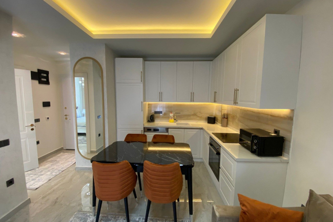 Стильные апартаменты 1+1 с мебелью в 4 минутах от пляжа – идеальны для жизни и аренды