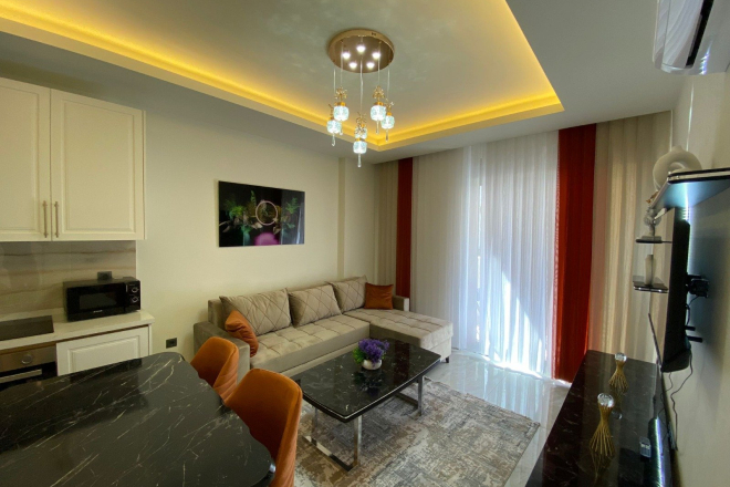 Стильные апартаменты 1+1 с мебелью в 4 минутах от пляжа – идеальны для жизни и аренды