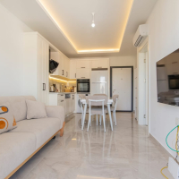 Меблированная 1+1 у моря в престижном районе c возможностью получения  ВНЖ