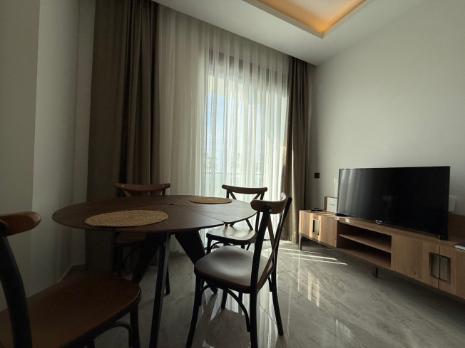 1+1 Уютная квартира 1+1 в новом комплексе в Демирташе. Полностью меблирована. Богатая инфраструктура