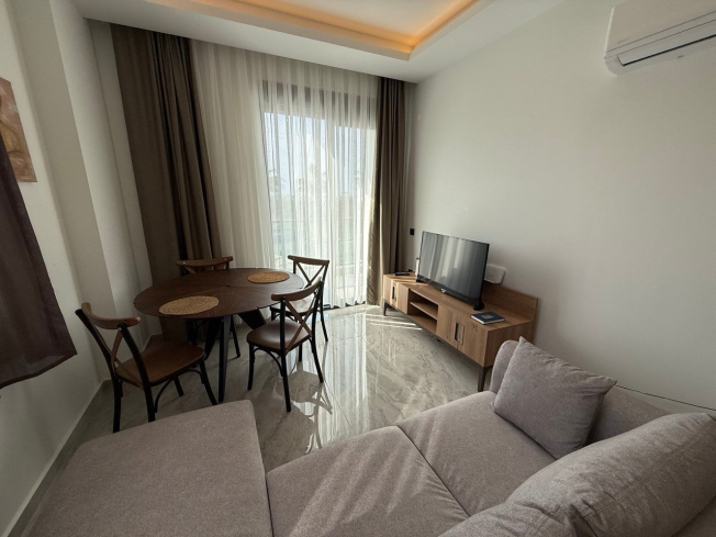 1+1 Уютная квартира 1+1 в новом комплексе в Демирташе. Полностью меблирована. Богатая инфраструктура