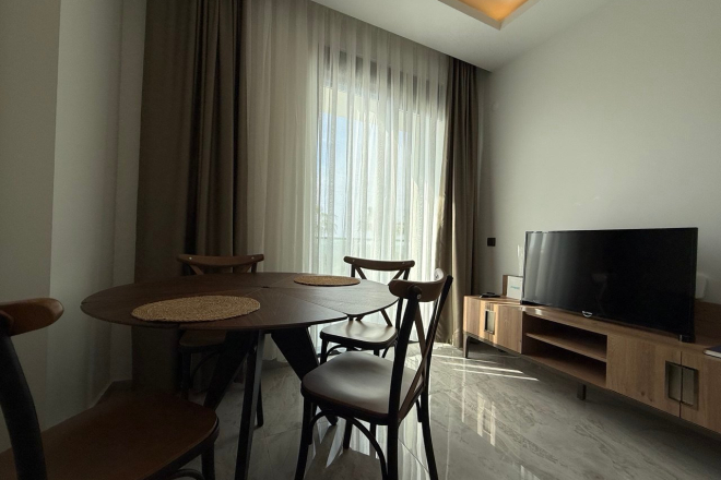 1+1 Уютная квартира 1+1 в новом комплексе в Демирташе. Полностью меблирована. Богатая инфраструктура