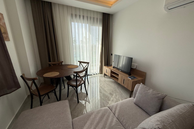 1+1 Уютная квартира 1+1 в новом комплексе в Демирташе. Полностью меблирована. Богатая инфраструктура