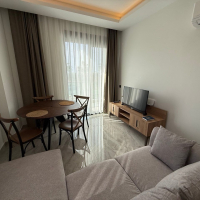 1+1 Уютная квартира 1+1 в новом комплексе в Демирташе. Полностью меблирована. Богатая инфраструктура