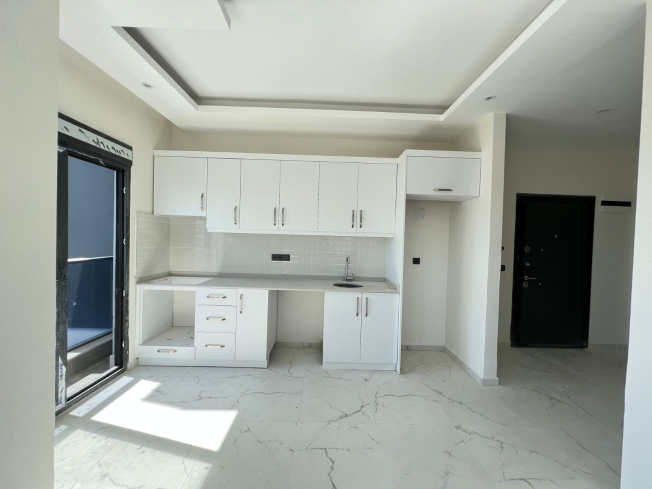 Современная квартира 1+1 в Махмутларе с видом на море — выгодная цена