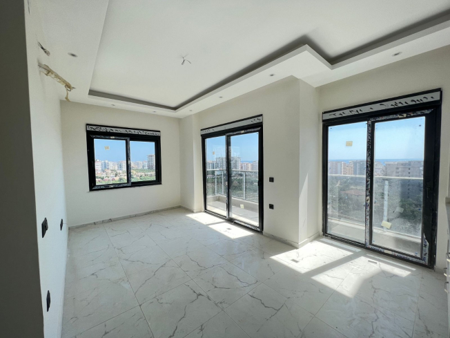 Современная квартира 1+1 в Махмутларе с видом на море — выгодная цена