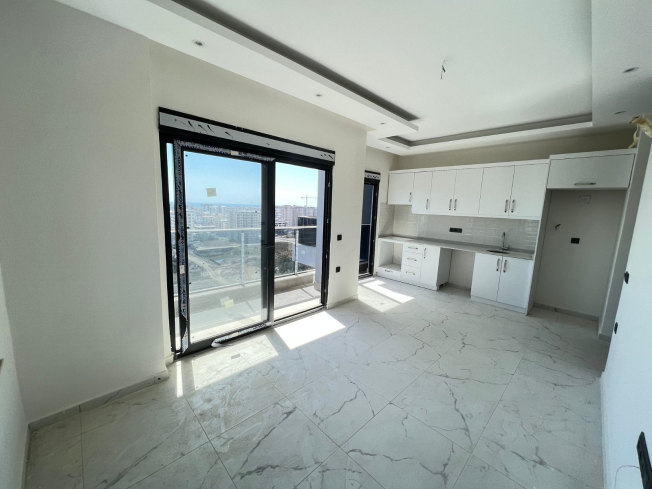 Современная квартира 1+1 в Махмутларе с видом на море — выгодная цена