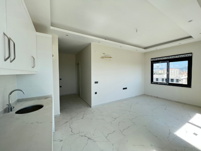 Современная квартира 1+1 в Махмутларе с видом на море — выгодная цена