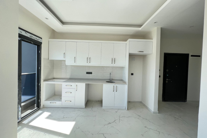 Современная квартира 1+1 в Махмутларе с видом на море — выгодная цена