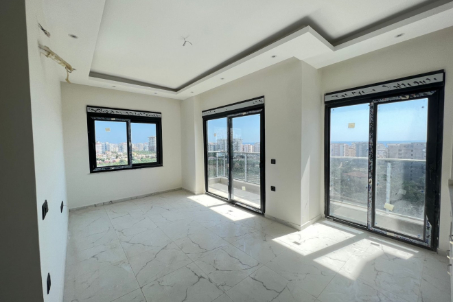 Современная квартира 1+1 в Махмутларе с видом на море — выгодная цена