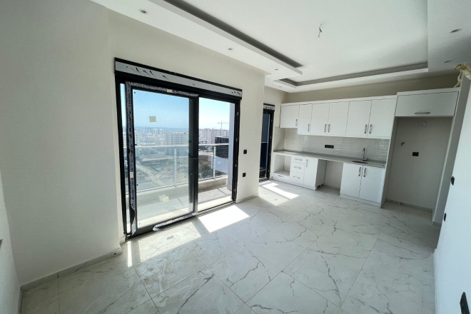 Современная квартира 1+1 в Махмутларе с видом на море — выгодная цена