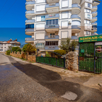 Стильная квартира 2+1 с дизайнерским ремонтом рядом с морем в Тосмуре