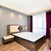 Стильная квартира 2+1 с дизайнерским ремонтом рядом с морем в Тосмуре