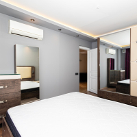 Стильная квартира 2+1 с дизайнерским ремонтом рядом с морем в Тосмуре