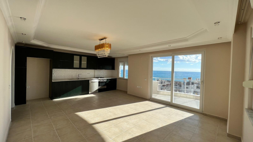 Просторные апартаменты 2+1 с панорамным видом у моря в Махмутларе