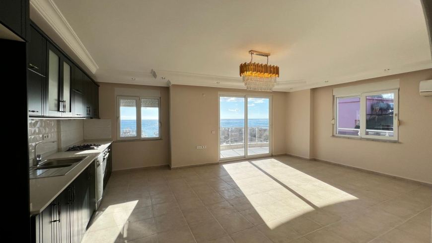 Просторные апартаменты 2+1 с панорамным видом у моря в Махмутларе