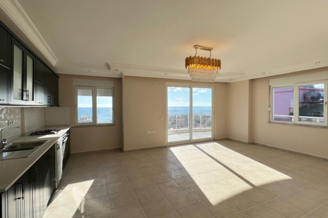 Просторные апартаменты 2+1 с панорамным видом у моря в Махмутларе