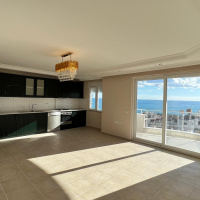 Просторные апартаменты 2+1 с панорамным видом у моря в Махмутларе