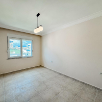 Просторные апартаменты 2+1 с панорамным видом у моря в Махмутларе