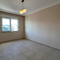 Просторные апартаменты 2+1 с панорамным видом у моря в Махмутларе