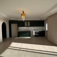 Просторные апартаменты 2+1 с панорамным видом у моря в Махмутларе