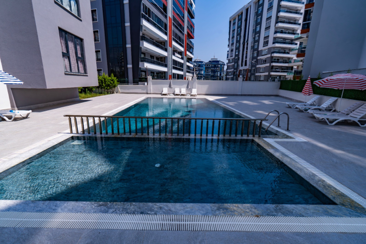 Современная квартира 1+1 рядом с морем и развитой инфраструктурой в Махмутларе