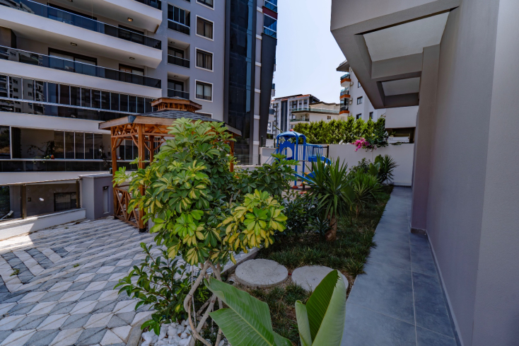 Современная квартира 1+1 рядом с морем и развитой инфраструктурой в Махмутларе