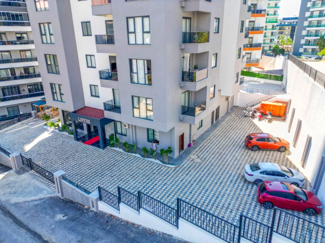 Современная квартира 1+1 рядом с морем и развитой инфраструктурой в Махмутларе