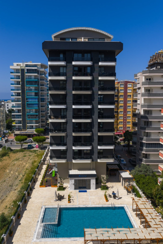 Merkezi konumda aktiviteli 1+1 geniş daire