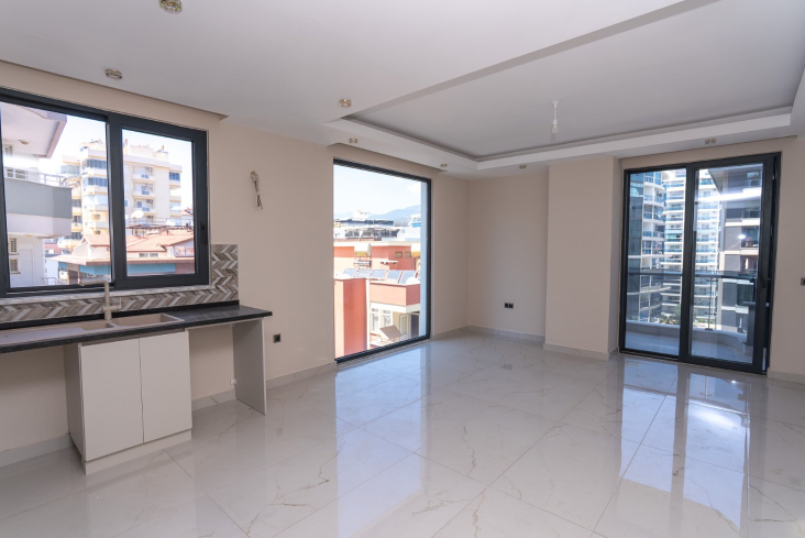 Merkezi konumda aktiviteli 1+1 geniş daire