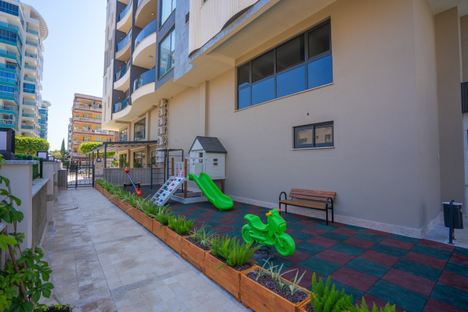 Merkezi konumda aktiviteli 1+1 geniş daire