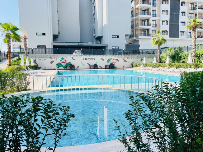 Современная квартира с видом на море в 100 метрах от пляжа — идеальна для отдыха и краткосрочной аренды