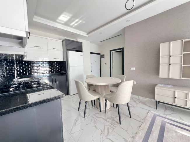 Современная квартира с видом на море в 100 метрах от пляжа — идеальна для отдыха и краткосрочной аренды