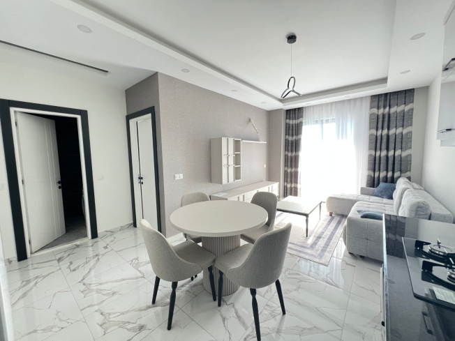 Современная квартира с видом на море в 100 метрах от пляжа — идеальна для отдыха и краткосрочной аренды