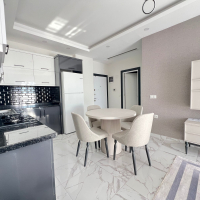 Современная квартира с видом на море в 100 метрах от пляжа — идеальна для отдыха и краткосрочной аренды