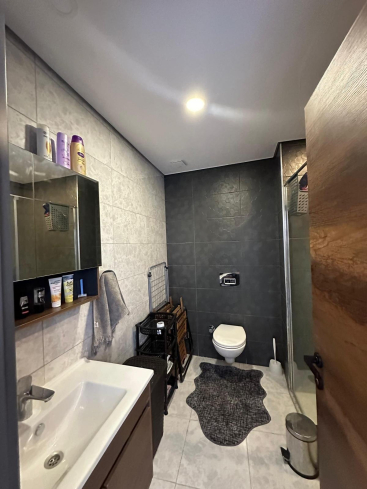 Меблированная 1+1 рядом с морем и полным отельным сервисом в центре Махмутлара