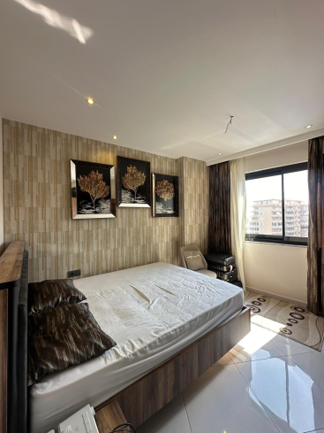 Меблированная 1+1 рядом с морем и полным отельным сервисом в центре Махмутлара