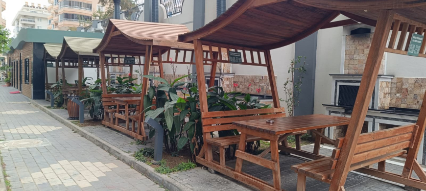 Меблированная 1+1 рядом с морем и полным отельным сервисом в центре Махмутлара