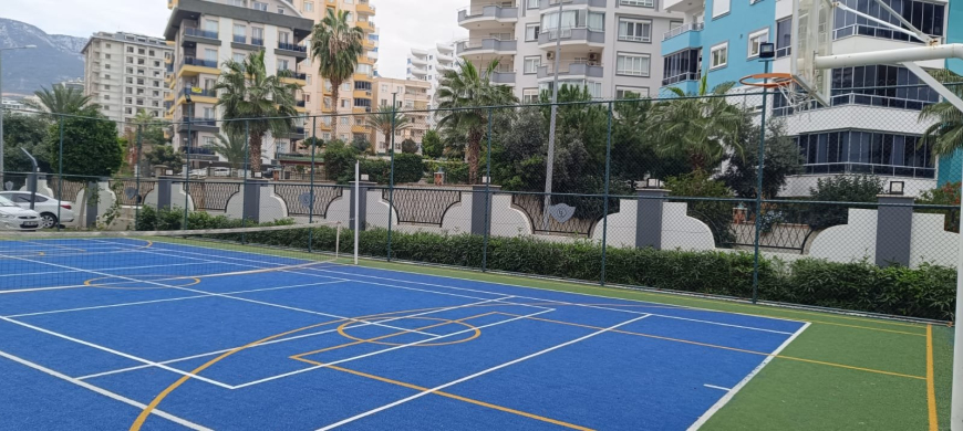 Меблированная 1+1 рядом с морем и полным отельным сервисом в центре Махмутлара