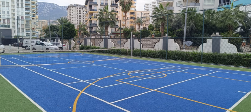 Меблированная 1+1 рядом с морем и полным отельным сервисом в центре Махмутлара