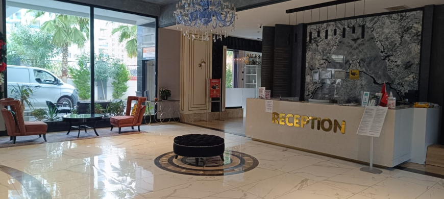 Меблированная 1+1 рядом с морем и полным отельным сервисом в центре Махмутлара