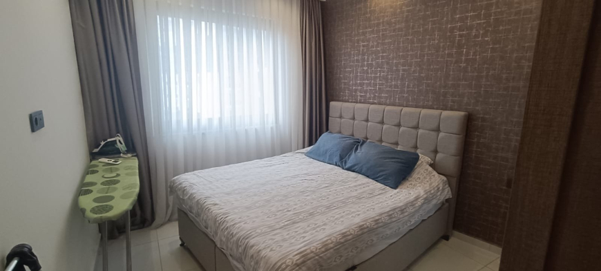 Меблированная 1+1 рядом с морем и полным отельным сервисом в центре Махмутлара