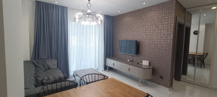 Меблированная 1+1 рядом с морем и полным отельным сервисом в центре Махмутлара