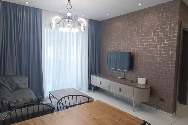 Меблированная 1+1 рядом с морем и полным отельным сервисом в центре Махмутлара