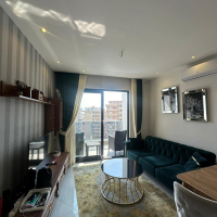 Меблированная 1+1 рядом с морем и полным отельным сервисом в центре Махмутлара