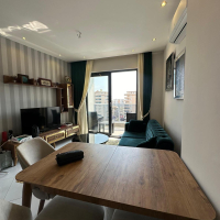 Меблированная 1+1 рядом с морем и полным отельным сервисом в центре Махмутлара